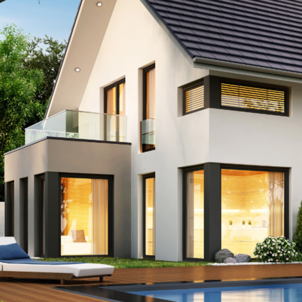 Large modern home featuring oversized picture windows
